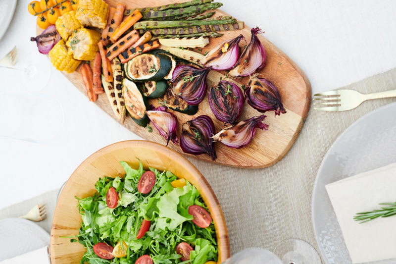 Roasted vegetables and salad with corn